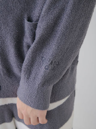 Close-up of the gray Smoothie Button Up Cardigan by Gelato Pique USA, featuring a front pocket and embroidered sleeve, part of premium loungewear and sleepwear.