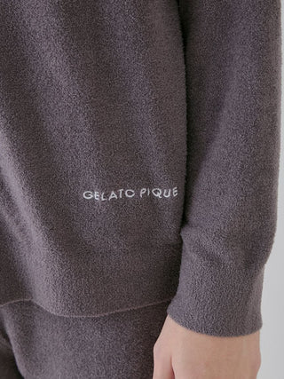 Gelato Pique USA's Smoothie Lite Men's Cardigan, premium loungewear and sleepwear, close-up of sleeve with logo embroidery.