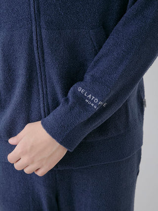 Cozy Gelato Pique USA navy hoodie with temperature-regulating Smoothie material and casual cuff logo, perfect for premium loungewear.