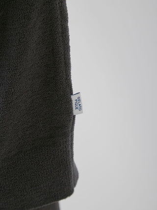 Premium loungewear fabric detail from Gelato Pique USA's Men's Air Moco Dinosaur Jacquard Cardigan.