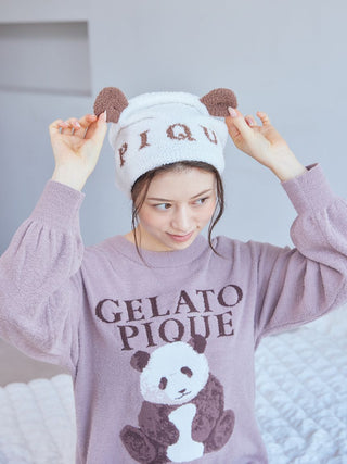 Woman wearing the Panda Jacquard Absorbent Headcap from Gelato Pique USA, featuring panda-inspired design and ultra-absorbent fabric.