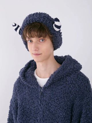 Person wearing PIQUE MONSTER headband with fluffy monster design, perfect for Halloween costumes, by gelato pique.