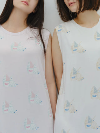 Two women wearing COOL Polar Bear Motif Sleeveless Maxi Dresses with whimsical polar bear prints on pale pink and white fabric.