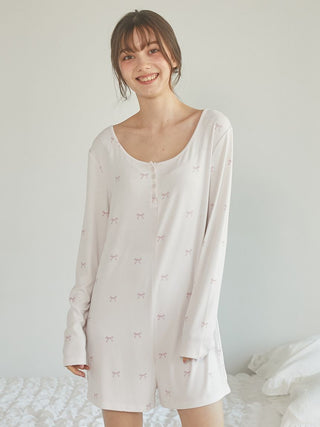 Woman wearing Gelato Pique USA off-white 3-pattern romper, premium loungewear and sleepwear, with a stylish wide chest opening and loose silhouette.