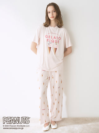 This Snoopy loungewear Pajama for women has a printed design Snoopy and Woodstock taking a nap on top of realistic Gelato. This is one of the coziest loungewear Pajama on the market. Pastel pink in coordination. 