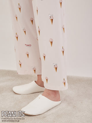 This Snoopy loungewear Pajama for women has a printed design Snoopy and Woodstock taking a nap on top of realistic Gelato. This is one of the coziest loungewear Pajama on the market. Lower side view