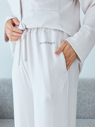 Close-up of Gelato Pique Snow Lounge Pants in heather gray, showing drawstring waistband and pocket detail for comfort and style.