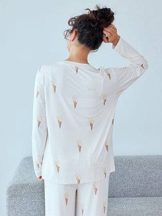 Back view of woman wearing Gelato Pique ice cream pattern long sleeve pajama shirt with soft fabric and playful print.