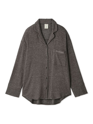 Dark gray long sleeve pajama shirt with front pocket and collar, offering comfort and style for a relaxing night at home.