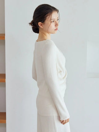 Woman wearing Snow Long Sleeve Shirt Loungewear with a sophisticated draped neckline and relaxed fit, embodying cozy comfort.