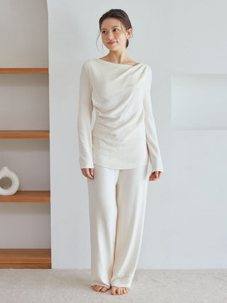 Woman wearing Snow Long Sleeve Shirt Loungewear, elegant draped neckline, relaxed silhouette, made by Gelato Pique USA.