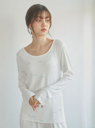 Gelato Pique USA off-white long sleeve T-shirt with logo pattern, premium loungewear and sleepwear, featuring wide neckline and feminine fit.