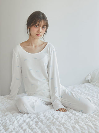 Woman wearing Gelato Pique USA off-white 3-pattern long sleeve T-shirt, showcasing premium loungewear and sleepwear style.