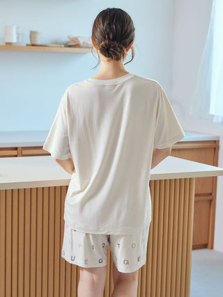 Back view of a woman wearing a Gelato Pique USA Rayon Logo Motif T-Shirt, showcasing premium loungewear and sleepwear with a soft feel.