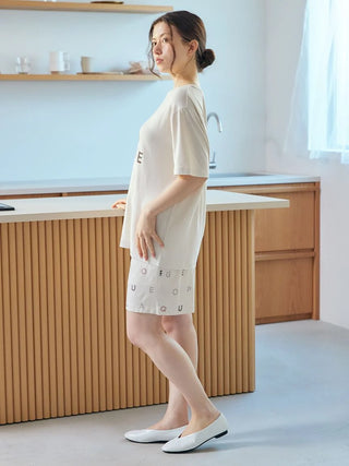Woman wearing cool-to-the-touch Gelato Pique rayon logo T-shirt, premium loungewear and sleepwear, in a calm color, Gelato Pique USA.