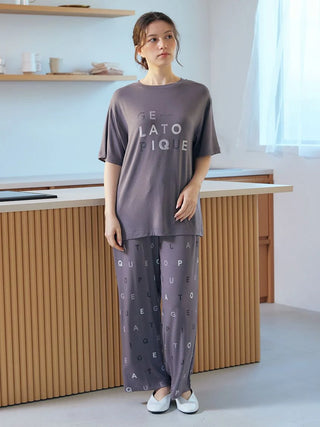 Model wearing Gelato Pique USA premium loungewear rayon logo T-shirt, showcasing a cool-to-the-touch design in a calm, elegant color scheme.