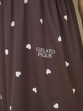 Close-up of Heart Motif Satin Cup Lounge Dress by Gelato Pique, featuring a delicate heart pattern on smooth satin fabric.