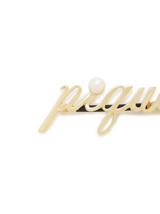 Gold metal barrette with script logo "Pique" and pearl accent, stylish hair accessory for elegance and minimalist design.