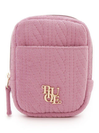 Pink Aran travel quilted makeup pouch with elegant pattern and gold accents, ideal for organizing beauty essentials on the go.