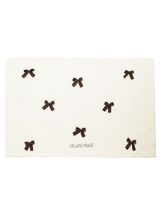 Ribbon Throw Blanket with black bow motifs, soft and fluffy texture, featuring a gelato pique logo, perfect for Halloween decor and gifts.