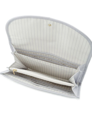 Interior view of Gelato Pique USA PIQUE Quilting Pocketbook Case M, showcasing elegant quilting and compartments for premium loungewear essentials.