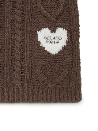 Heart Aran Lap Blanket with cable-knit pattern and Gelato Pique logo, featuring heart motifs for cozy home comfort.