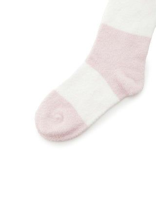 Cozy pink and white Smoothie 2 Border Fuzzy Socks by Gelato Pique with a plush, fuzzy texture for ultimate comfort and warmth.