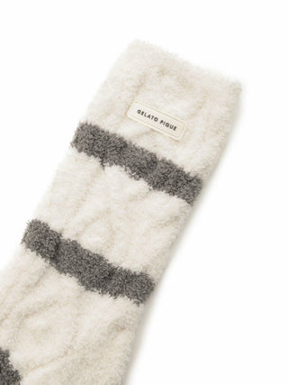 Close-up of Baby Moco Aran Fuzzy Socks by Gelato Pique in cream with gray stripes, featuring soft and cozy fabric.