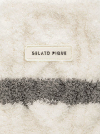 Close-up of Gelato Pique Baby Moco Aran Fuzzy Socks showing soft, fluffy fabric with brand label.