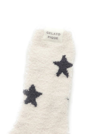 Premium Gelato Pique USA ivory fuzzy socks with black star pattern, ideal for loungewear and sleepwear.