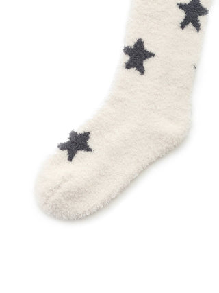 Alt Tag: Premium white fuzzy socks with black star pattern by Gelato Pique USA, perfect for loungewear and sleepwear comfort.