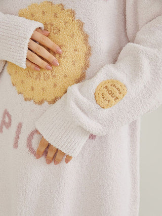 Close-up of Powder Biscuit Jacquard Lounge Dress with biscuit design and soft texture, showcasing cozy knit sleeves.