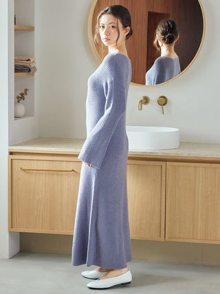 Woman wearing a Classy Moco Maxi Lounge Dress in front of a bathroom mirror.