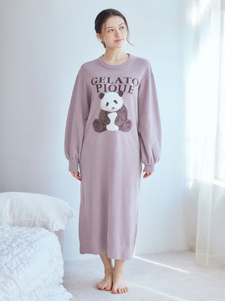 Woman wearing cozy Panda Jacquard Lounge Dress with long sleeves and panda graphic by Gelato Pique, standing barefoot in a serene room.