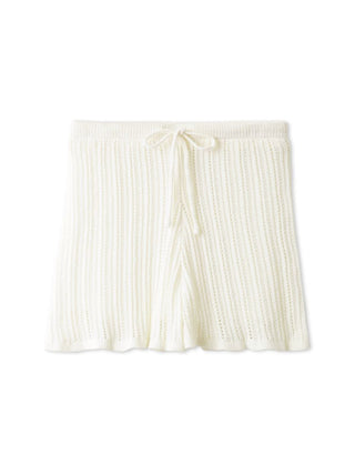 White crochet shorts from Gelato Pique with fine vertical ribbing and a drawstring waist, showcasing elegance and comfort.