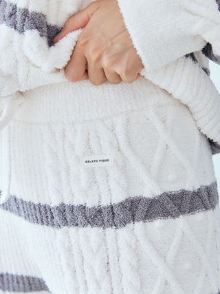 Close-up of Baby Moco Aran Border Lounge Pants by Gelato Pique, featuring soft fabric with Aran cable knit and stripe design.