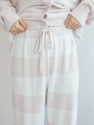 Smoothie 2-Border Pants in soft pastel pink stripes, featuring a drawstring waist and chic pockets.