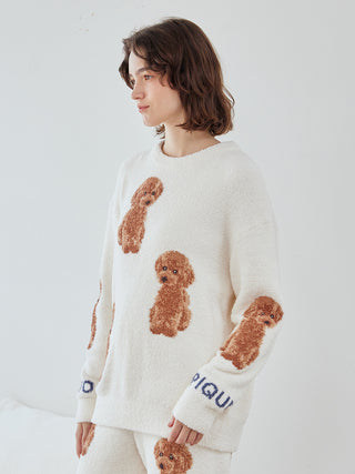 Woman wearing Gelato Pique Toy Poodle Pullover Sweater with plush fabric and jacquard poodle motifs, showcasing cozy and stylish design.