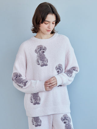 Woman wearing a Toy Poodle Pullover Sweater with jacquard poodle motifs by Gelato Pique, showcasing its softness and playful design.