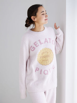 Woman wearing Powder Biscuit Jacquard Pullover Sweater by Gelato Pique, featuring a soft cream base with biscuit design.