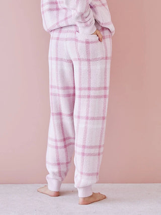 Women's pink checkered pajama set in soft fabric, showcasing a relaxed fit and pastel tone design, ideal for cozy comfort and style.