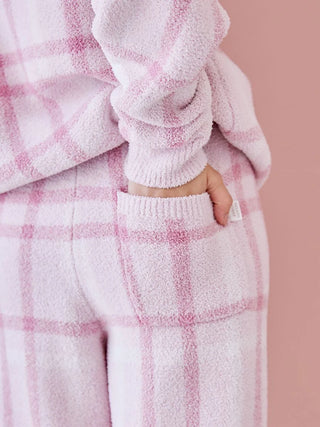 Close-up of women's checkered pajama set in pastel tones, highlighting the soft fabric and relaxed fit from Gelato Pique.