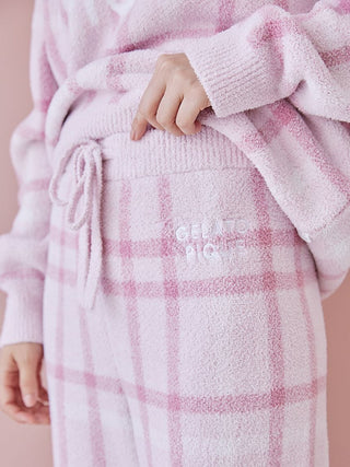 Close-up of a woman's pastel checkered pajama set by Gelato Pique, showcasing soft fabric and drawstring waist for ultimate comfort.