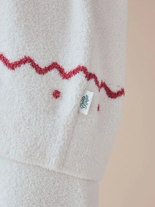 Soft Baby Moco Nordic pullover fabric with festive red pattern, showcasing cozy texture and gentle design for kids.