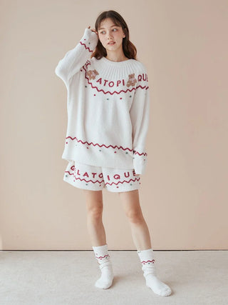 Woman wearing Nordic Pullover & Shorts Set in festive pattern from Holiday Collection, crafted with soft 'Baby Moco' fabric for comfort.