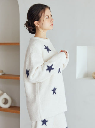 Woman wearing Gelato Pique USA off-white star jacquard pullover, showcasing cozy premium loungewear for home lounging and sleepwear.