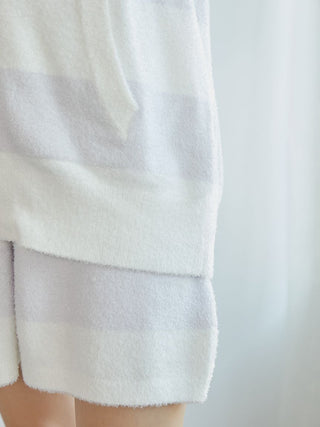 Close-up of the 2025 Smoothie 2-Border Parka showcasing soft pastel stripes and cozy fabric texture.