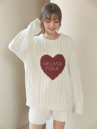 White Heart Aran Pullover Sweater with red heart and Gelato Pique logo, featuring intricate Aran cable-knit pattern.