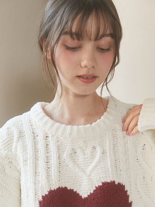 Heart Aran pullover sweater with intricate cable-knit and plush heart detail from Gelato Pique USA, worn by a model.