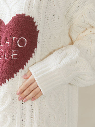 Close-up of Heart Aran Pullover Sweater with heart motif and cable-knit pattern from Gelato Pique.